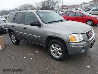 2005 GMC Envoy SLE with VIN 1GKDS13S852381305, listed as a IAAI auction lot 41344564 with 295,385 mi miles. Bid and sale history available at carsss.com. Image 1.