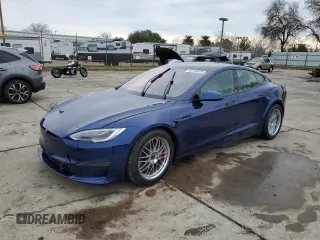 2021 Tesla Model S Long Range z VIN 5YJSA1E53MF443685, wystawiony jako Copart lot #43743535 z przebiegiem Nie podano mil oraz Szkoda całkowita • Salvage title. Historia ofert i sprzedaży dostępna na DreamBid. Obrazek 1.