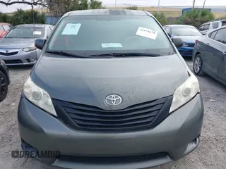 2014 Toyota Sienna L with VIN 5TDZK3DC6ES421278, listed as a IAAI auction lot 41178679 with 202,823 mi miles. Bid and sale history available at carsss.com. Image 12.