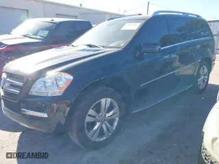 2012 Mercedes-Benz GL-Class GL 450 with VIN 4JGBF7BE2CA795653, listed as a IAAI auction lot 41847301 with 144,137 mi miles. Bid and sale history available at carsss.com. Image 2.