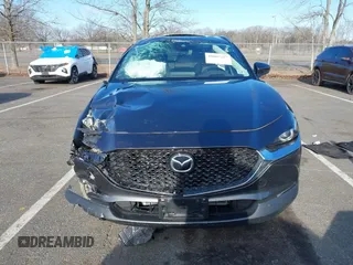 2022 Mazda CX-30 S Premium with VIN 3MVDMBDL9NM403273, listed as a IAAI auction lot 41607227 with Not Provided miles and . Bid and sale history available at carsss.com. Image 13.