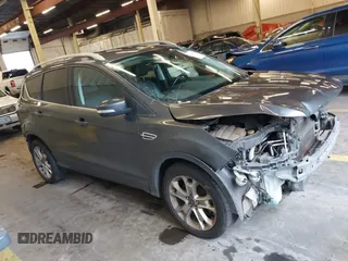 2016 Ford Escape Titanium with VIN 1FMCU9J92GUB63525, listed as a IAAI auction lot 41469824 with 156,773 mi miles. Bid and sale history available at carsss.com. Image 13.