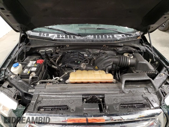 2015 Ford F-150 XLT z VIN 1FTEW1E81FKE92611, wystawiony jako Copart lot #55768005 z przebiegiem 118 600 mil mil oraz Szkoda całkowita • Salvage title. Historia ofert i sprzedaży dostępna na DreamBid. Obrazek 11.