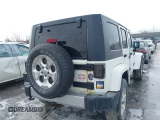 2010 Jeep Wrangler Unlimited Sahara with VIN 1J4HA5H19AL177179, listed as a IAAI auction lot 41565342 with 181,392 mi miles. Bid and sale history available at carsss.com. Image 4.