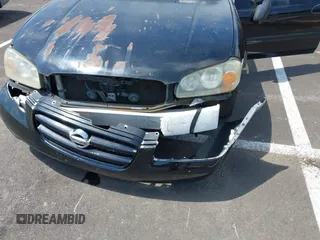 2002 Nissan Maxima GLE z VIN JN1DA31AX2T325038, wystawiony jako IAAI lot #42250279 z przebiegiem 169 555 mil mil oraz . Historia ofert i sprzedaży dostępna na DreamBid. Obrazek 6.