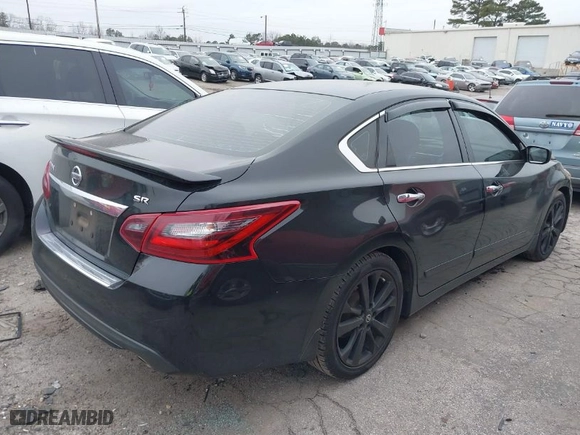 2017 Nissan Altima 2.5 SV with VIN 1N4AL3AP6HC209400, listed as a IAAI auction lot 41382120 with 82,486 mi miles. Bid and sale history available at carsss.com. Image 4.