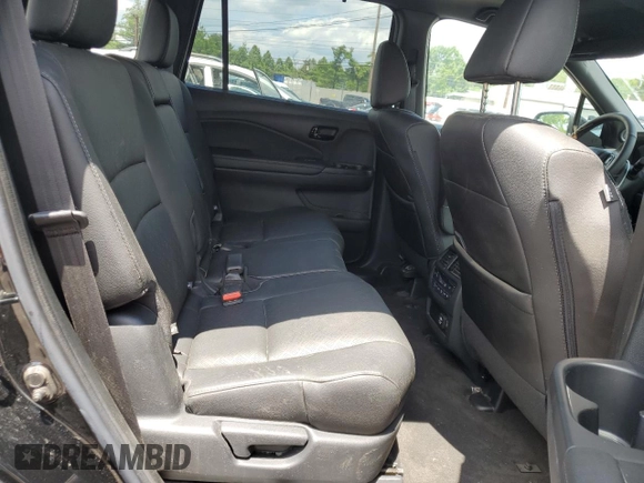 2023 Honda Passport Elite with VIN 5FNYF8H01PB030270, listed as a Copart auction lot 61402965 with 7,931 mi miles and Salvage title. Bid and sale history available at DreamBid. Image 11.