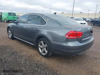 2012 Volkswagen Passat SE with VIN 1VWBH7A3XCC054344, listed as a IAAI auction lot 41290377 with 195,009 mi miles. Bid and sale history available at carsss.com. Image 3.