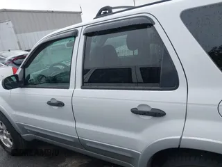 2007 Ford Escape XLT with VIN 1FMYU03197KB80133, listed as a IAAI auction lot 41084715 with 185,132 mi miles and . Bid and sale history available at DreamBid. Image 14.