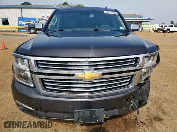2015 Chevrolet Tahoe LTZ z VIN 1GNSCCKC8FR102859, wystawiony jako Copart lot #56755555 z przebiegiem 167 191 mil mil oraz Czysty tytuł • Clean title. Historia ofert i sprzedaży dostępna na DreamBid. Obrazek 12.