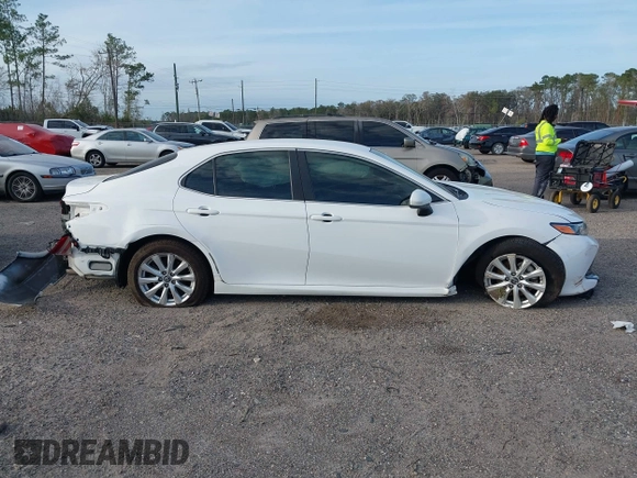2019 Toyota Camry LE with VIN 4T1B11HK7KU806197, listed as a IAAI auction lot 41721148 with 83,373 mi miles and . Bid and sale history available at DreamBid. Image 13.