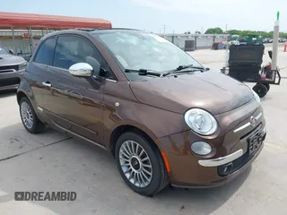2012 FIAT 500 Lounge z VIN 3C3CFFCR7CT248587, wystawiony jako IAAI lot #41951594 z przebiegiem 88 987 mil mil oraz . Historia ofert i sprzedaży dostępna na DreamBid. Obrazek 1.