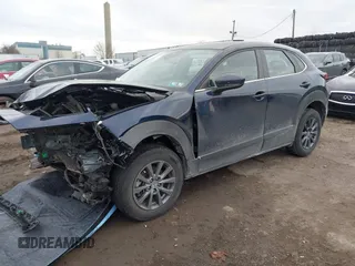 2022 Mazda CX-30 S with VIN 3MVDMBAL8NM411739, listed as a IAAI auction lot 41668265 with 34,964 mi miles and . Bid and sale history available at carsss.com. Image 2.