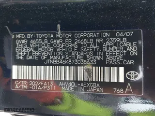2007 Toyota Camry Hybrid with VIN JTNBB46K873038633, listed as a IAAI auction lot 41927918 with 203,466 mi miles. Bid and sale history available at carsss.com. Image 9.