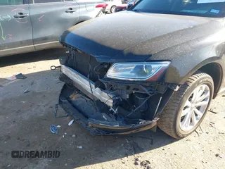 2014 Audi Q5 Premium Plus z VIN WA1LFAFP9EA130988, wystawiony jako IAAI lot #41835596 z przebiegiem 91 303 mil mil oraz . Historia ofert i sprzedaży dostępna na DreamBid. Obrazek 6.