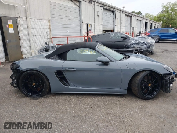 2023 Porsche 718 Spyder with VIN WP0CC2A83PS222034, listed as a IAAI auction lot 41222380 with 5,932 mi miles and . Bid and sale history available at DreamBid. Image 14.