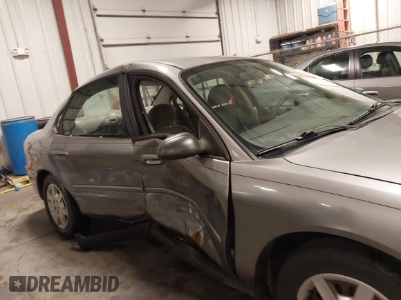 2006 Ford Taurus SE with VIN 1FAFP53U86A113947, listed as a IAAI auction lot 41753927 with 203,867 mi miles. Bid and sale history available at carsss.com. Image 13.