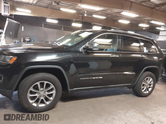 2015 Jeep Grand Cherokee Limited with VIN 1C4RJFBG8FC762873, listed as a IAAI auction lot 42098428 with 244,676 mi miles. Bid and sale history available at carsss.com. Image 14.