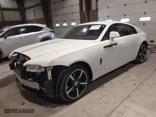 2014 Rolls-Royce Wraith with VIN SCA665C59EUX84389, listed as a IAAI auction lot 41413368 with 57,951 mi miles. Bid and sale history available at carsss.com. Image 18.