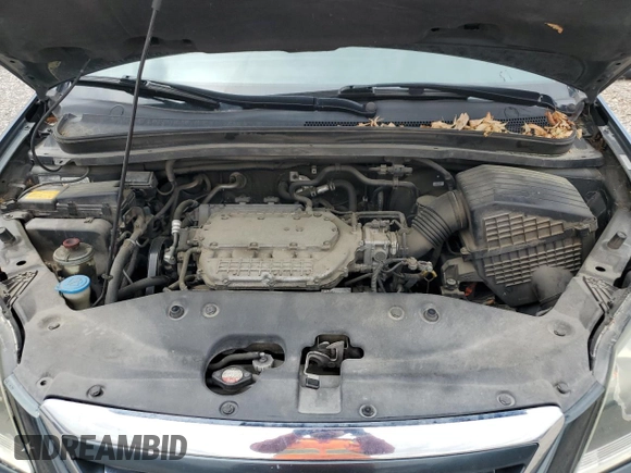 2006 Honda Odyssey EX-L z VIN 5FNRL38786B014188, wystawiony jako Copart lot #57140935 z przebiegiem Nie podano mil oraz Szkoda całkowita • Salvage title. Historia ofert i sprzedaży dostępna na DreamBid. Obrazek 12.