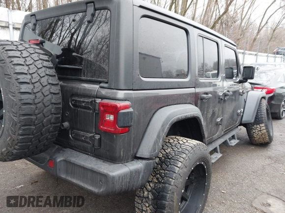 2020 Jeep Wrangler Unlimited Sport z VIN 1C4HJXDN3LW164701, wystawiony jako IAAI lot #41200437 z przebiegiem 102 272 mil mil oraz . Historia ofert i sprzedaży dostępna na DreamBid. Obrazek 4.