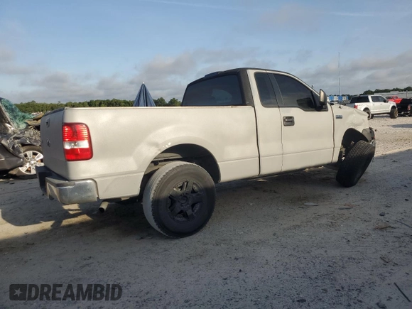 2005 Ford F-150 XL with VIN 1FTRF12235NC10435, listed as a Copart auction lot 57311935 with 249,847 mi miles and Salvage title. Bid and sale history available at DreamBid. Image 3.