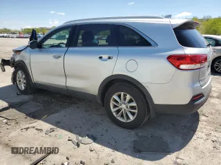 2017 Kia Sorento LX z VIN 5XYPGDA3XHG236574, wystawiony jako Copart lot #56359835 z przebiegiem 105 297 mil mil oraz Szkoda całkowita • Salvage title. Historia ofert i sprzedaży dostępna na DreamBid. Obrazek 2.