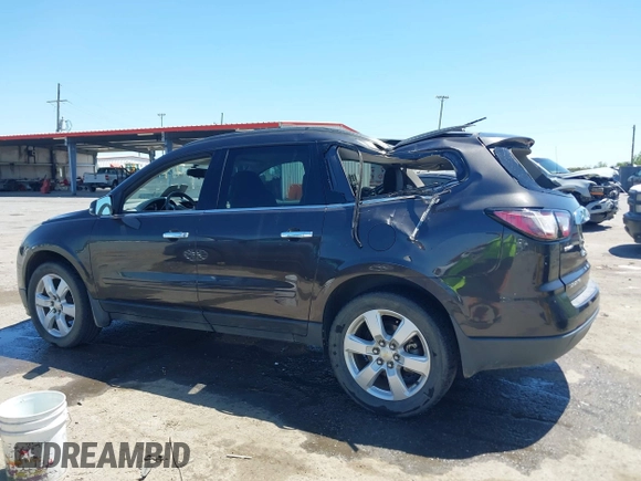 2017 Chevrolet Traverse LT with VIN 1GNKRGKD7HJ129888, listed as a IAAI auction lot 42009764 with 136,091 mi miles and . Bid and sale history available at DreamBid. Image 14.