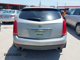 2015 Cadillac SRX Luxury Collection z VIN 3GYFNBE35FS627640, wystawiony jako IAAI lot #42262843 z przebiegiem 211 669 mil mil oraz . Historia ofert i sprzedaży dostępna na DreamBid. Obrazek 16.