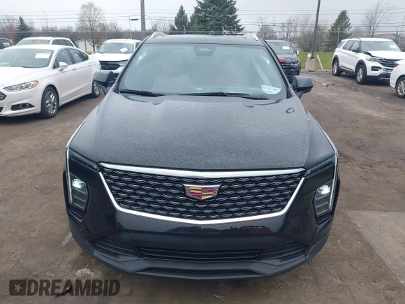 2024 Cadillac XT4 AWD Luxury with VIN 1GYFZBR41RF101697, listed as a IAAI auction lot 41971217 with 16,027 mi miles and . Bid and sale history available at carsss.com. Image 12.