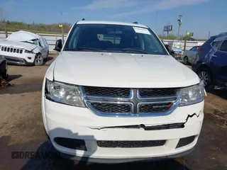 2014 Dodge Journey SE with VIN 3C4PDCAB0ET293641, listed as a IAAI auction lot 42001844 with 138,740 mi miles. Bid and sale history available at carsss.com. Image 12.