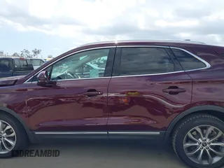 2019 Lincoln MKC Select with VIN 5LMCJ2C95KUL22363, listed as a IAAI auction lot 42245861 with 34,316 mi miles and . Bid and sale history available at DreamBid. Image 14.