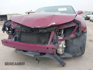 2014 Chevrolet Camaro LT z VIN 2G1FC1E3XE9317459, wystawiony jako IAAI lot #41168805 z przebiegiem 126 298 mil mil oraz . Historia ofert i sprzedaży dostępna na DreamBid. Obrazek 6.