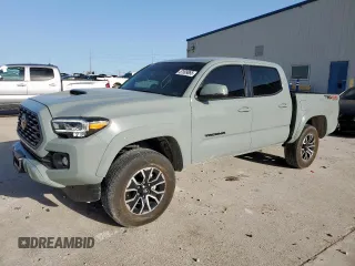 2023 Toyota Tacoma SR with VIN 3TYCZ5AN4PT118767, listed as a Copart auction lot 57599065 with 33,471 mi miles and Salvage title. Bid and sale history available at DreamBid. Image 1.
