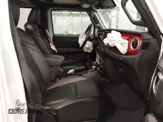 2022 Jeep Wrangler Unlimited Rubicon z VIN 1C4HJXFG7NW106446, wystawiony jako IAAI lot #41405202 z przebiegiem 39 755 mil mil oraz . Historia ofert i sprzedaży dostępna na DreamBid. Obrazek 5.