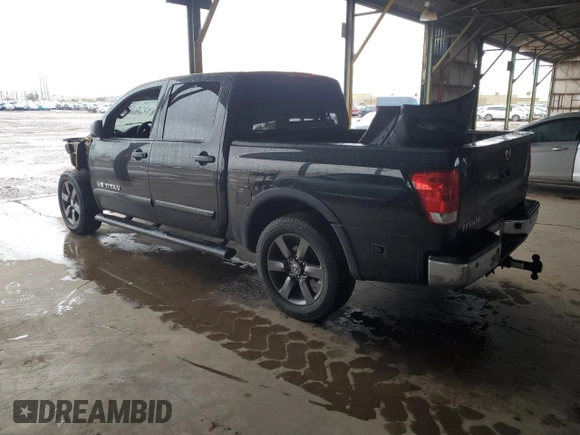 2015 Nissan Titan SL with VIN 1N6AA0ED1FN503994, listed as a Copart auction lot 39525224 with 104,353 mi miles and Salvage Title. Bid and sale history available at DreamBid. Image 2.