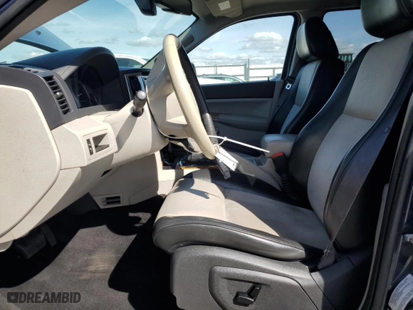 2009 Jeep Grand Cherokee Limited with VIN 1J8HR58TX9C545941, listed as a Copart auction lot 49995955 with 147,329 mi miles and Salvage Title. Bid and sale history available at carsss.com. Image 7.
