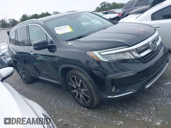 2019 Honda Pilot Touring 7-Passenger z VIN 5FNYF5H66KB027960, wystawiony jako IAAI lot #41863212 z przebiegiem 114 615 mil mil oraz . Historia ofert i sprzedaży dostępna na DreamBid. Obrazek 1.