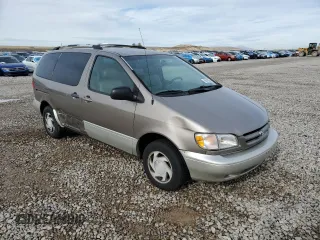 1999 Toyota Sienna LE with VIN 4T3ZF13C7XU133135, listed as a Copart auction lot 80618034 with 200,910 mi miles and Salvage Title. Bid and sale history available at carsss.com. Image 4.