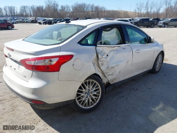 2012 Ford Focus SEL with VIN 1FAHP3H23CL183151, listed as a IAAI auction lot 41800487 with 165,370 mi miles. Bid and sale history available at carsss.com. Image 4.