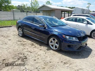 2014 Volkswagen CC R-Line with VIN WVWBP7AN7EE507463, listed as a IAAI auction lot 41984136 with 100,531 mi miles. Bid and sale history available at carsss.com. Image 1.