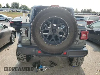 2020 Jeep Wrangler Unlimited Sahara with VIN 1C4HJXEM2LW337002, listed as a Copart auction lot 71056504 with 0 mi miles and Salvage Title. Bid and sale history available at carsss.com. Image 6.
