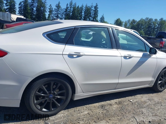 2017 Ford Fusion SE z VIN 3FA6P0HD3HR132779, wystawiony jako IAAI lot #42690212 z przebiegiem 165 293 mil mil oraz . Historia ofert i sprzedaży dostępna na DreamBid. Obrazek 13.