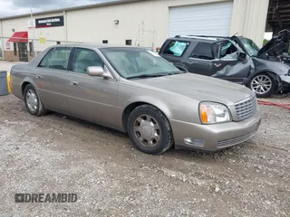 2000 Cadillac DeVille z VIN 1G6KD54Y5YU317015, wystawiony jako IAAI lot #42441249 z przebiegiem 82 901 mil mil oraz . Historia ofert i sprzedaży dostępna na DreamBid. Obrazek 1.
