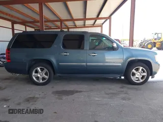 2009 Chevrolet Suburban LTZ with VIN 1GNFC36J29R293712, listed as a IAAI auction lot 42577800 with 202,593 mi miles and . Bid and sale history available at DreamBid. Image 13.