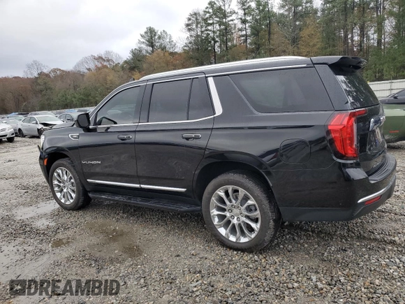 2023 GMC Yukon SLT with VIN 1GKS2BKD7PR122685, listed as a Copart auction lot 84611444 with 52,271 mi miles and Salvage Title. Bid and sale history available at carsss.com. Image 2.