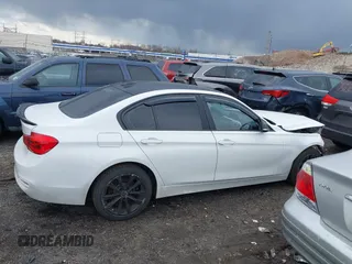 2018 BMW 3 Series 320i xDrive with VIN WBA8E5G52JNU46803, listed as a IAAI auction lot 41869625 with 67,057 mi miles. Bid and sale history available at carsss.com. Image 14.
