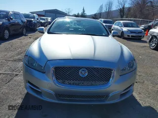 2014 Jaguar XJ z VIN SAJWJ1CD0E8V63989, wystawiony jako IAAI lot #41643513 z przebiegiem 119 924 mil mil oraz . Historia ofert i sprzedaży dostępna na DreamBid. Obrazek 12.