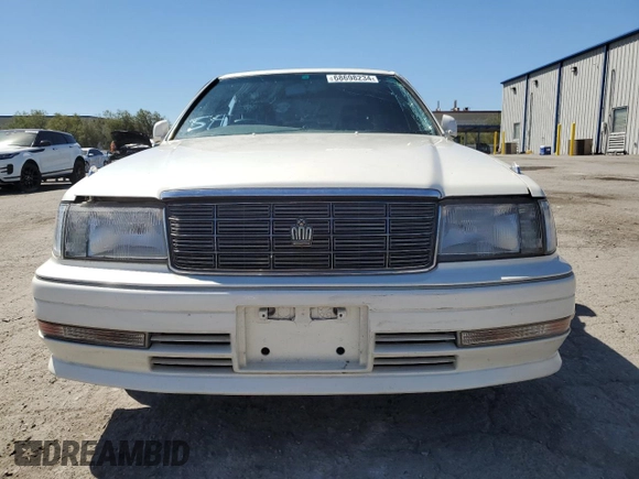 1996 Toyota Crown z VIN JZS1550042389, wystawiony jako Copart lot #68698234 z przebiegiem 117 283 mil mil oraz Szkoda całkowita • Salvage title. Historia ofert i sprzedaży dostępna na DreamBid. Obrazek 5.