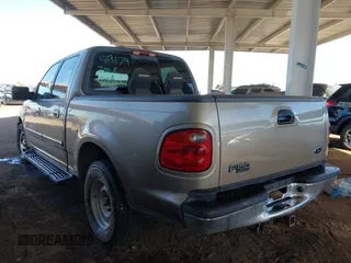 2003 Ford F-150 XLT with VIN 1FTRW07693KA29179, listed as a IAAI auction lot 41726462 with 191,365 mi miles. Bid and sale history available at carsss.com. Image 3.